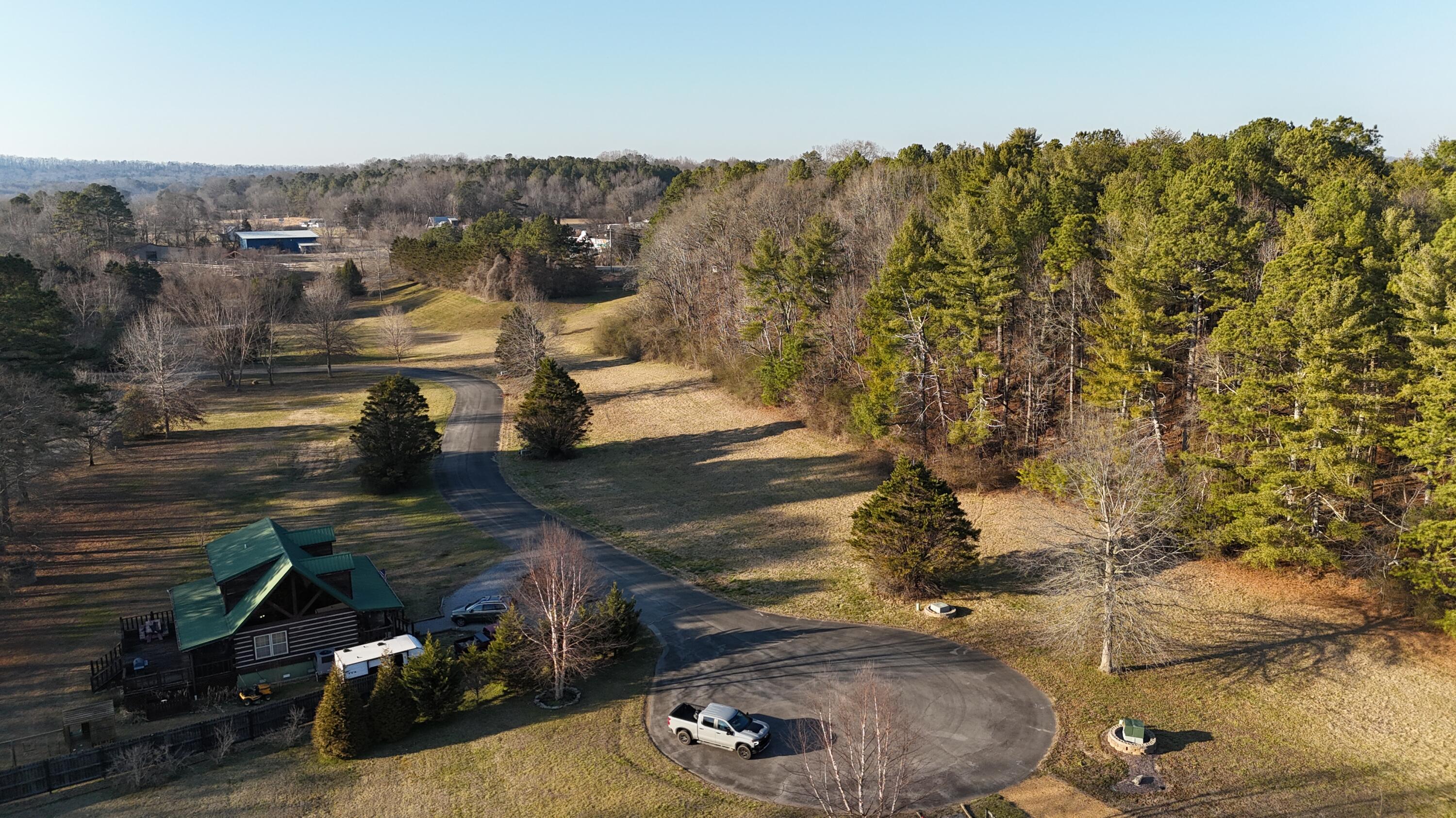 109 Tadpole Lane Benton, TN 37307 - Photo 8 of 48 dji_fly_20260209_164418_0115_17706753348