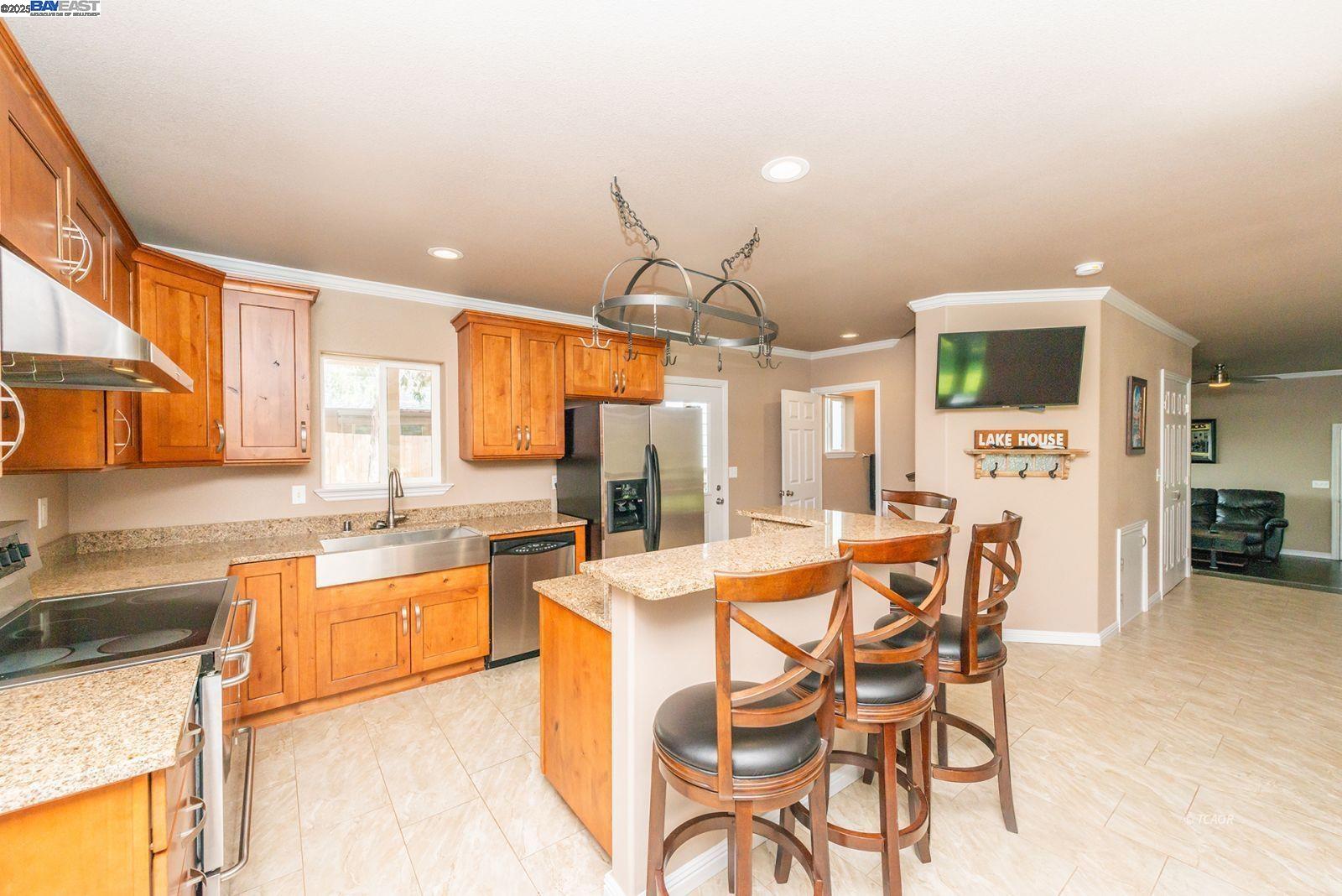 250 Mary Avenue Trinity Center, CA 96091 - Photo 13 of 49 a large kitchen with a table and chairs in it