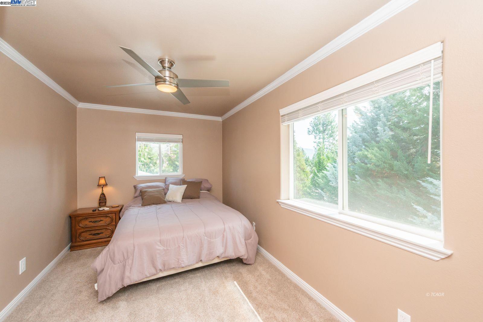 250 Mary Avenue Trinity Center, CA 96091 - Photo 33 of 49 a bedroom with a large bed and a window