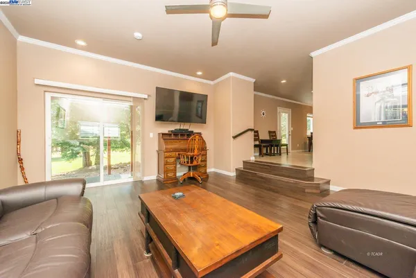 a living room with furniture and a table