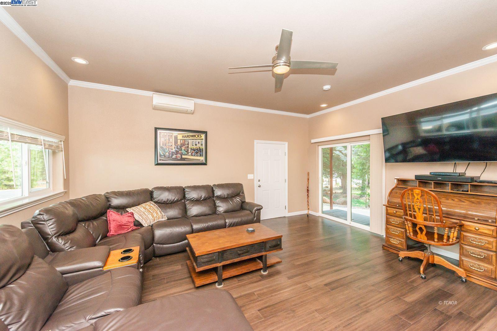 250 Mary Avenue Trinity Center, CA 96091 - Photo 8 of 49 a living room with furniture and a flat screen tv