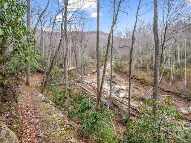 a view of mountains and valleys
