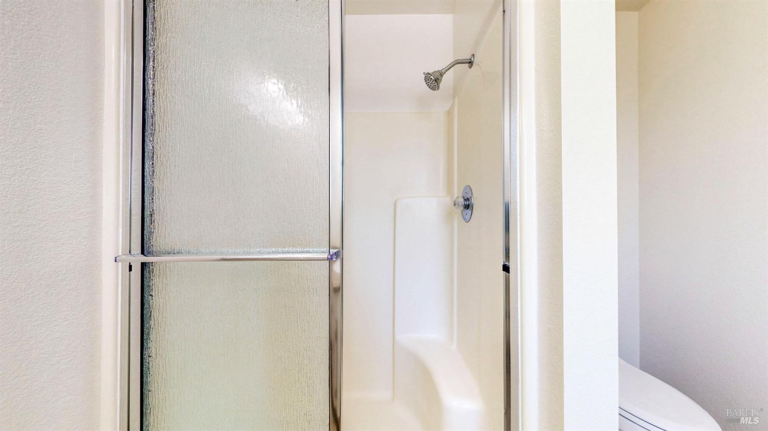 158 North Dutton Avenue Santa Rosa, CA 95401 - Photo 35 of 50 a bathroom with a glass shower door