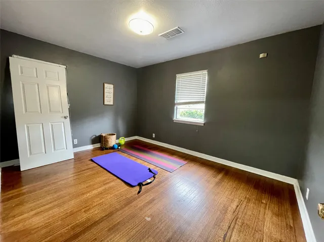 a view of a backyard with swimming pool