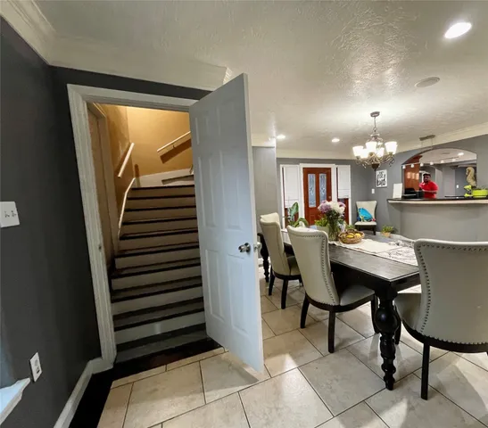 a bed room with a bed and a television