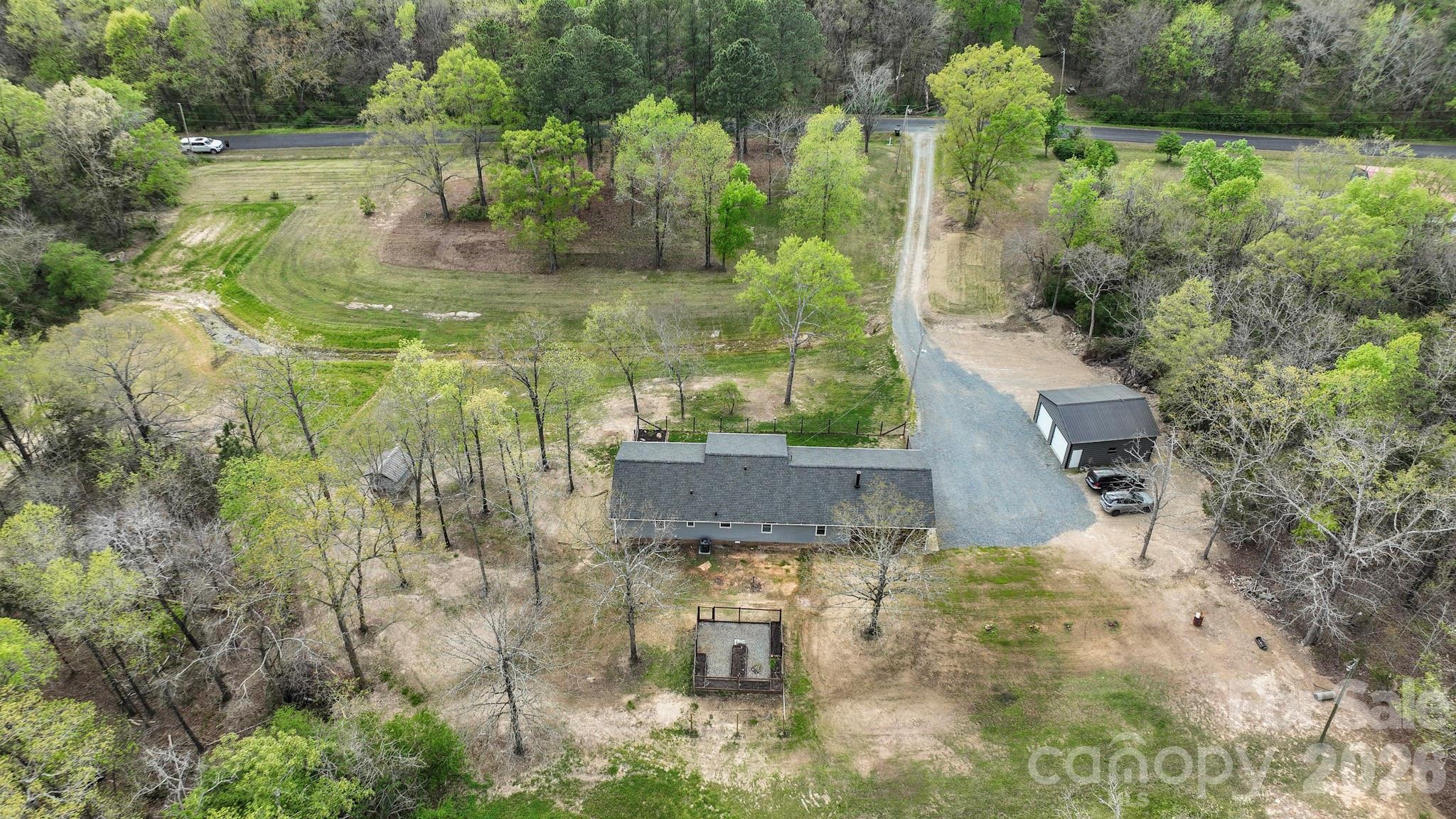 1925 Sojourn Road Marshville, NC 28103 - Photo 14 of 41 an aerial view of residential house with outdoor space