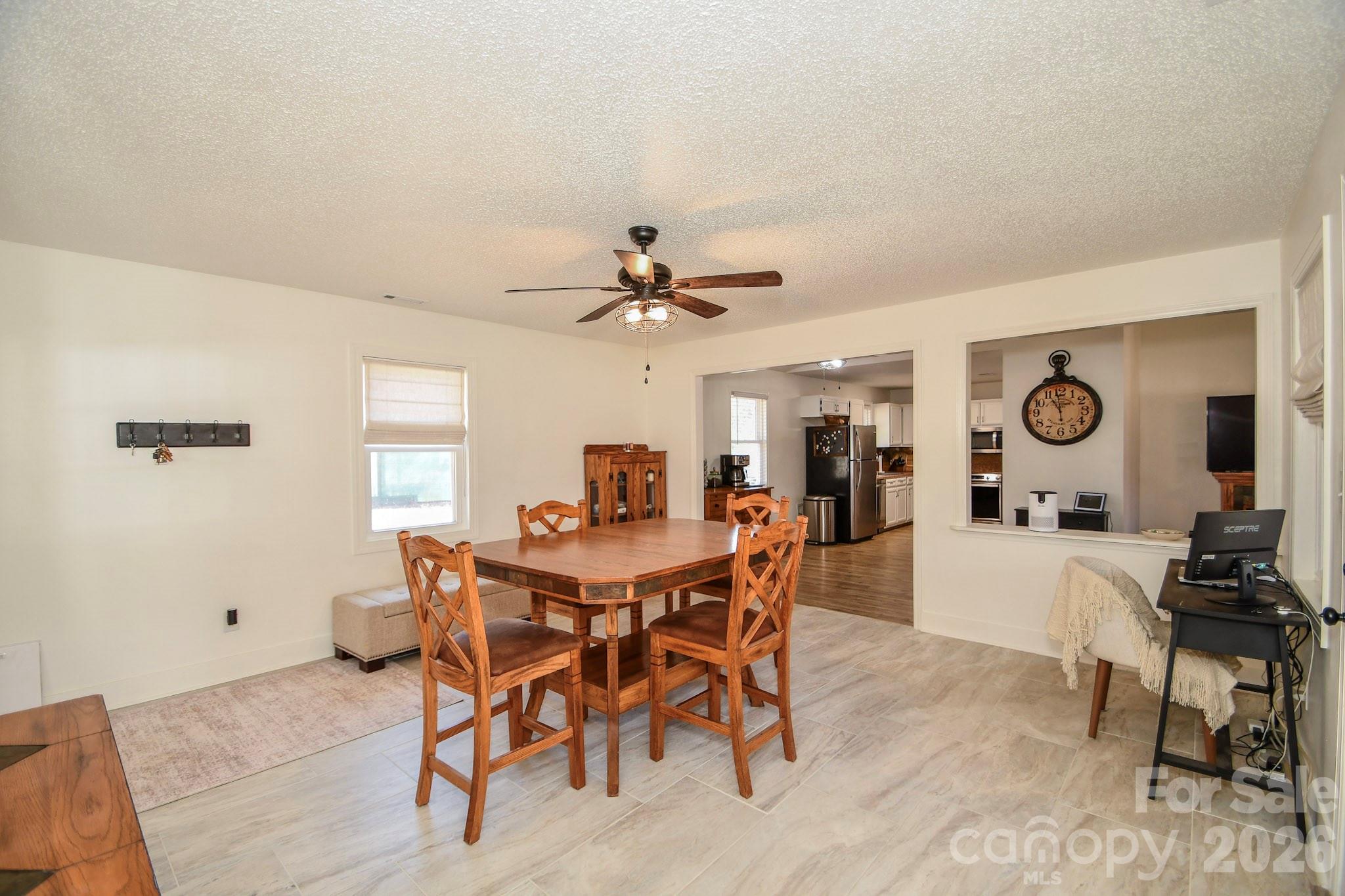 1925 Sojourn Road Marshville, NC 28103 - Photo 25 of 41 a view of a dining room with furniture and window
