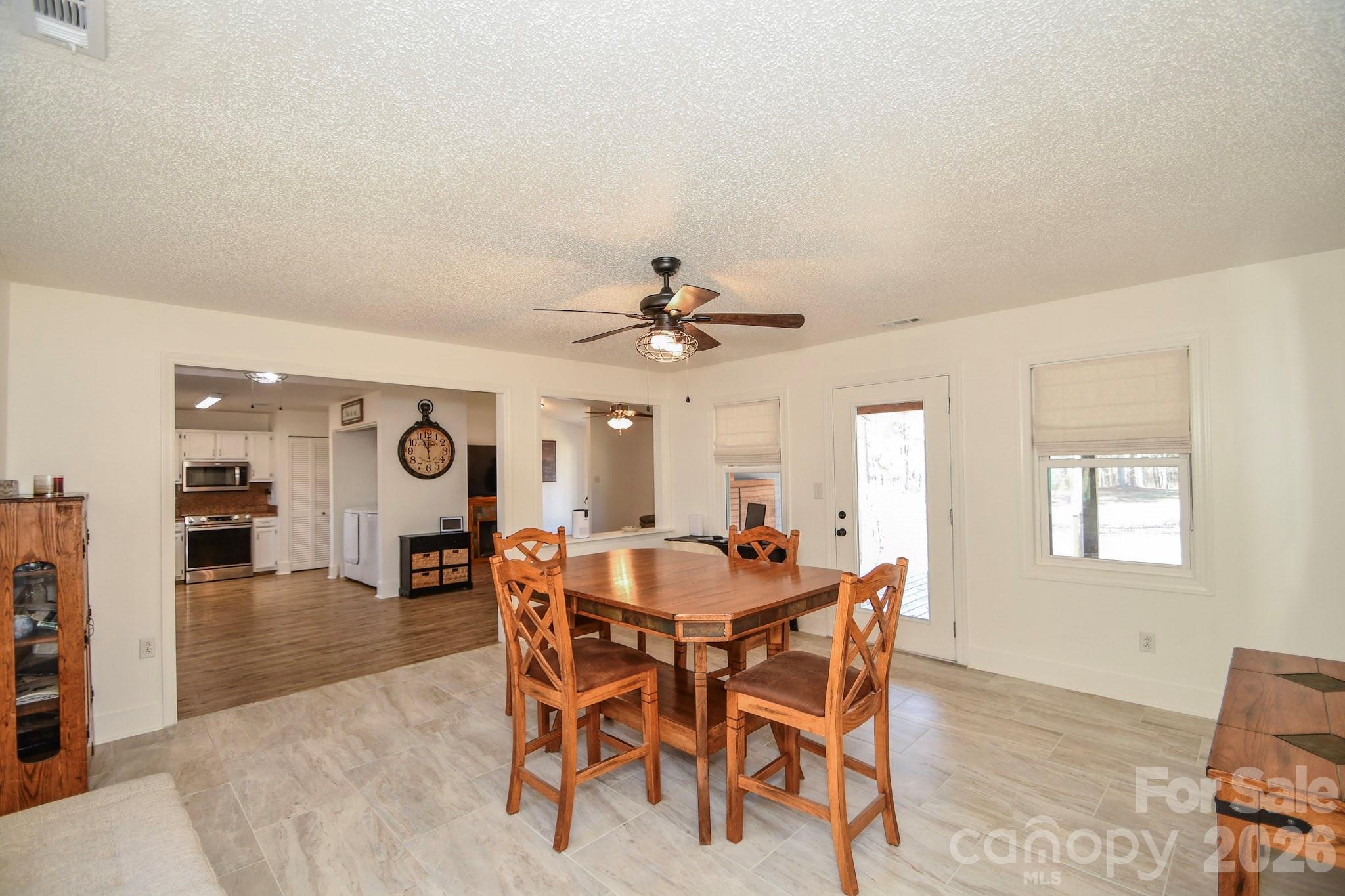 1925 Sojourn Road Marshville, NC 28103 - Photo 26 of 41 a dining room with furniture and window