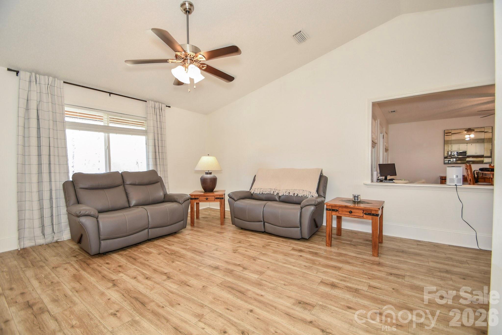 1925 Sojourn Road Marshville, NC 28103 - Photo 33 of 41 a living room with furniture and a large window