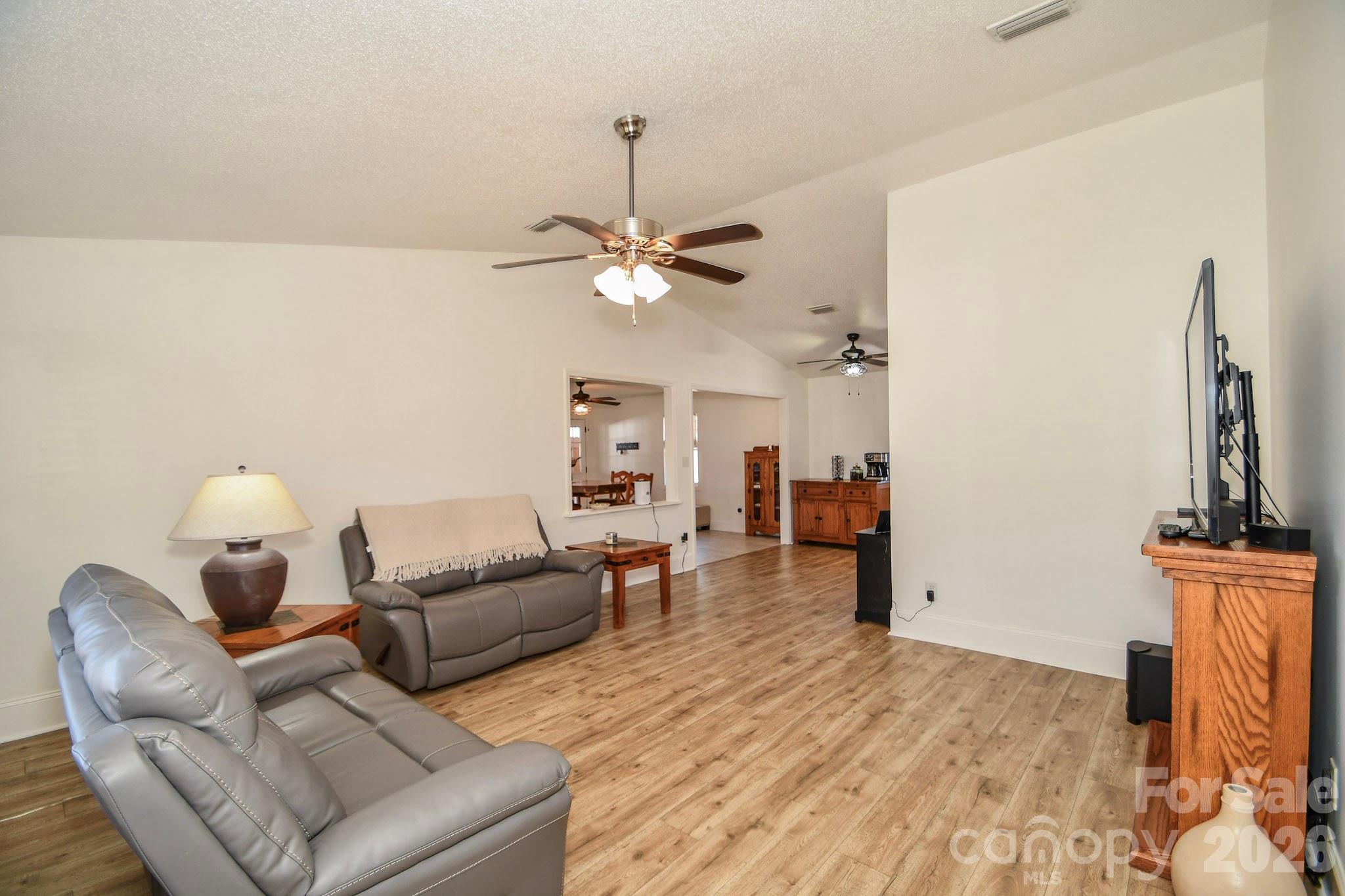 1925 Sojourn Road Marshville, NC 28103 - Photo 34 of 41 a living room with furniture and a fireplace