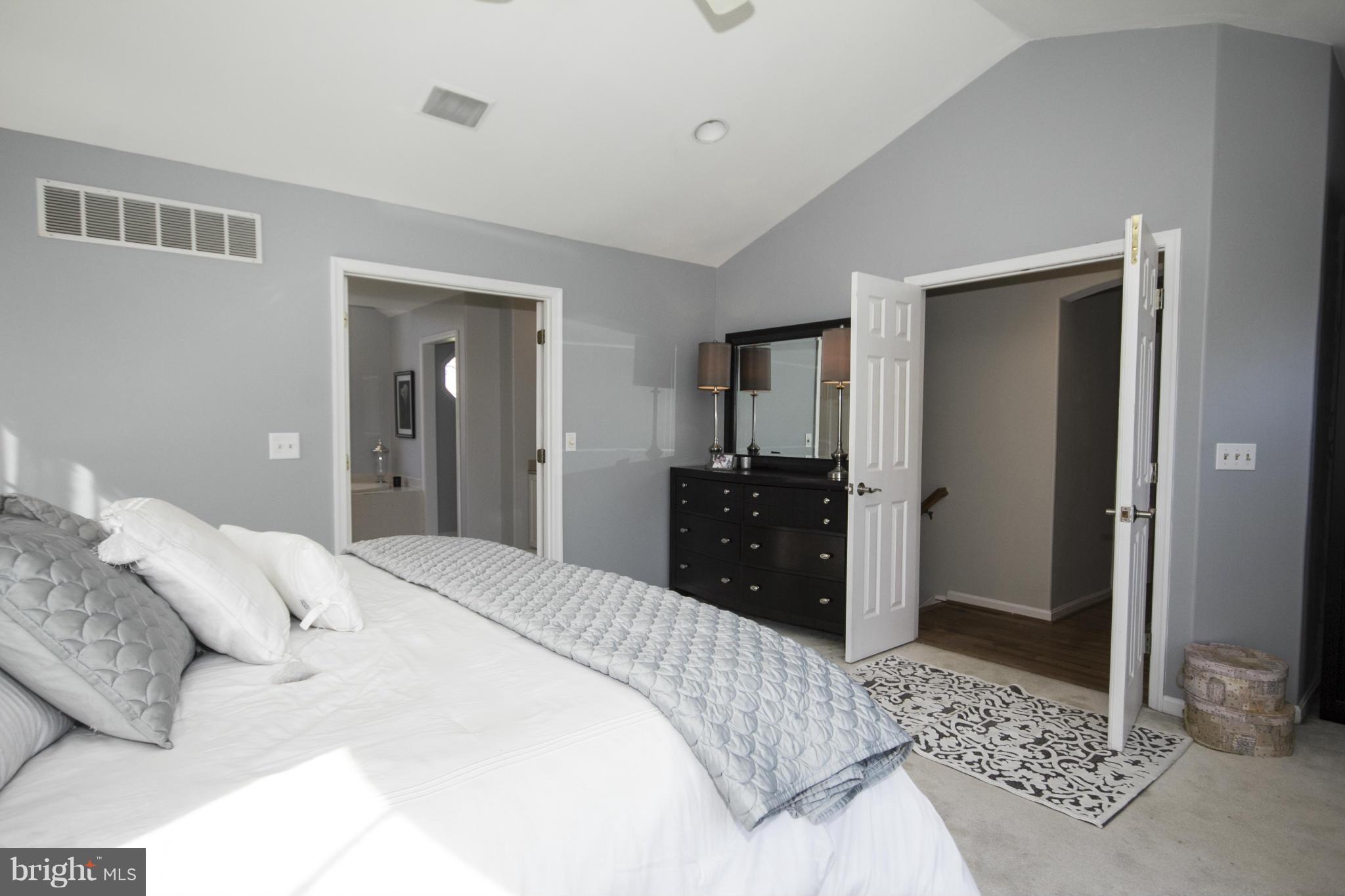 16200 Yeoho Road Sparks, MD 21152 - Photo 20 of 30 a bedroom with a bed and a walk in closet