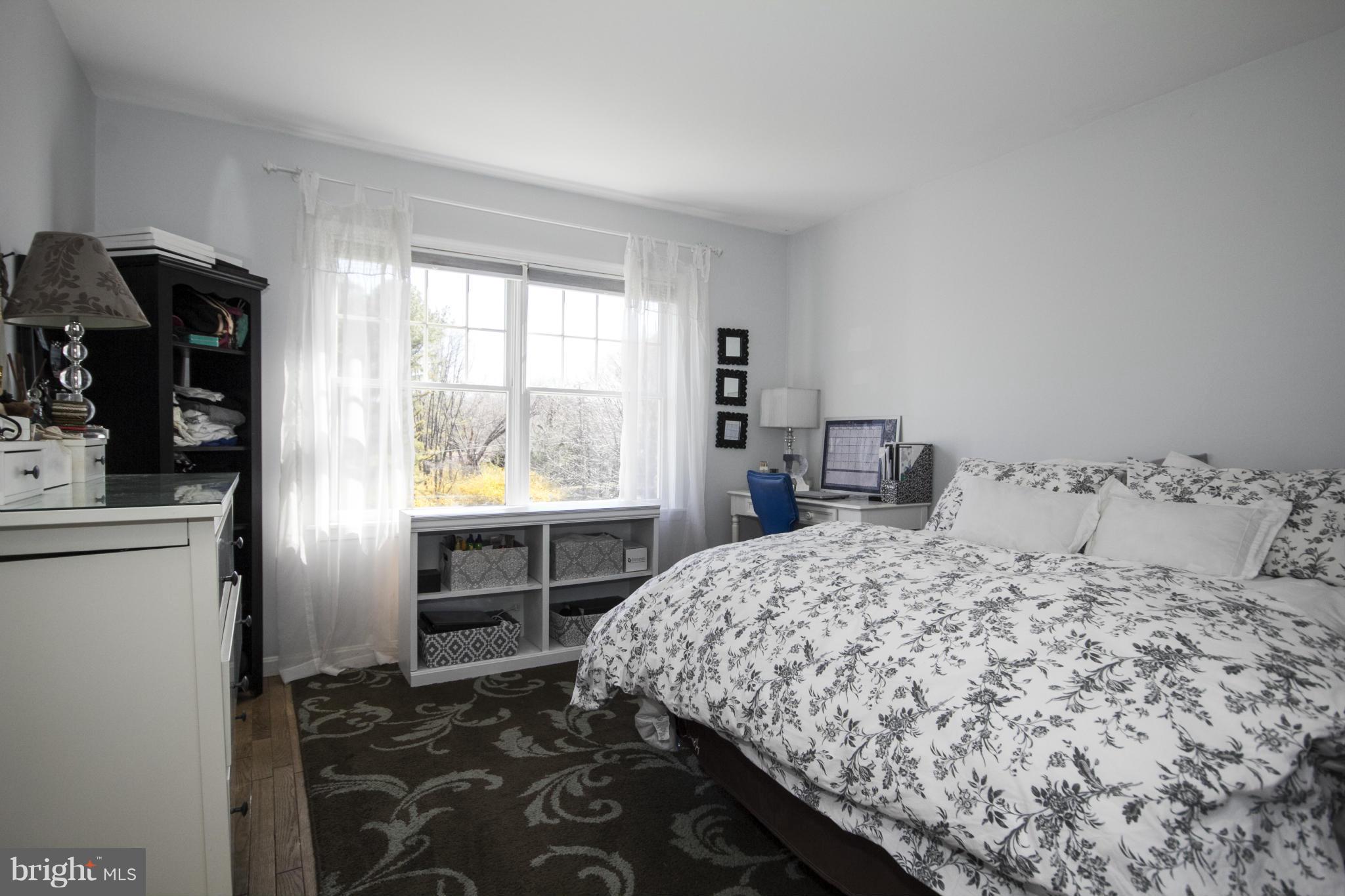 16200 Yeoho Road Sparks, MD 21152 - Photo 24 of 30 a bedroom with a bed and a window