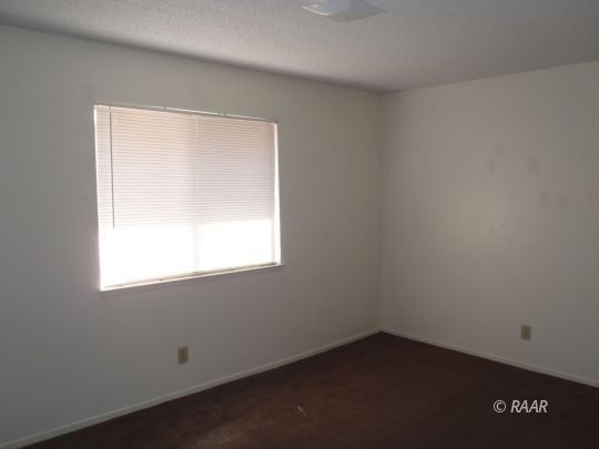 733 Commercial Ridgecrest, CA 93555 - Photo 11 of 15 an empty room with a window