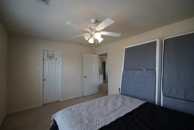 a room with cabinets and a wooden floor