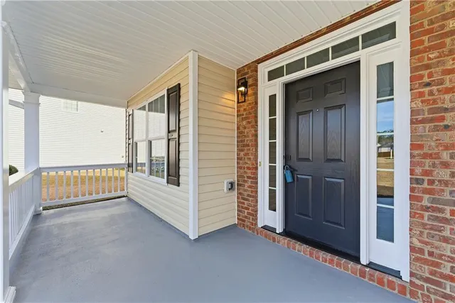 a view of a balcony with entryway