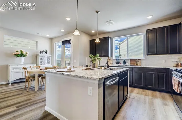 a kitchen with lots of counter top space and appliances