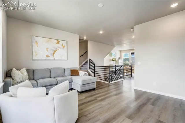 a view of a hallway with stairs