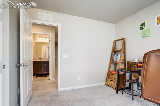 a bathroom with a sink toilet and vanity