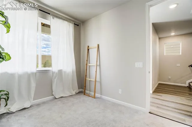 an empty room with windows