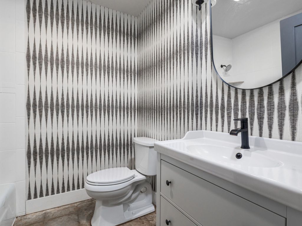 9506 Mountain Quail Road Austin, TX 78758 - Photo 11 of 16 Hall bathroom has been tastefully redone.