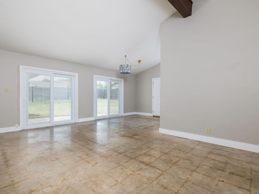 9506 Mountain Quail Road Austin, TX 78758 - Photo 6 of 16 Living room has tremendous natural right from west-facing French doors, which open to back patio.