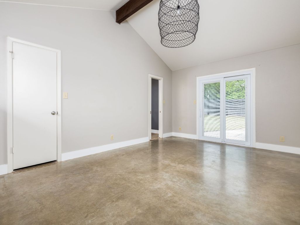 9506 Mountain Quail Road Austin, TX 78758 - Photo 7 of 16 Primary bedroom has high ceilings, and a French door leading to back patio.