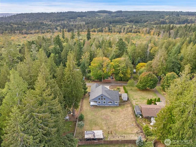 an aerial view of residential house with outdoor space