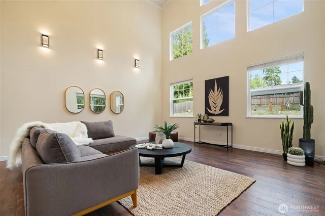 a living room with furniture and a table
