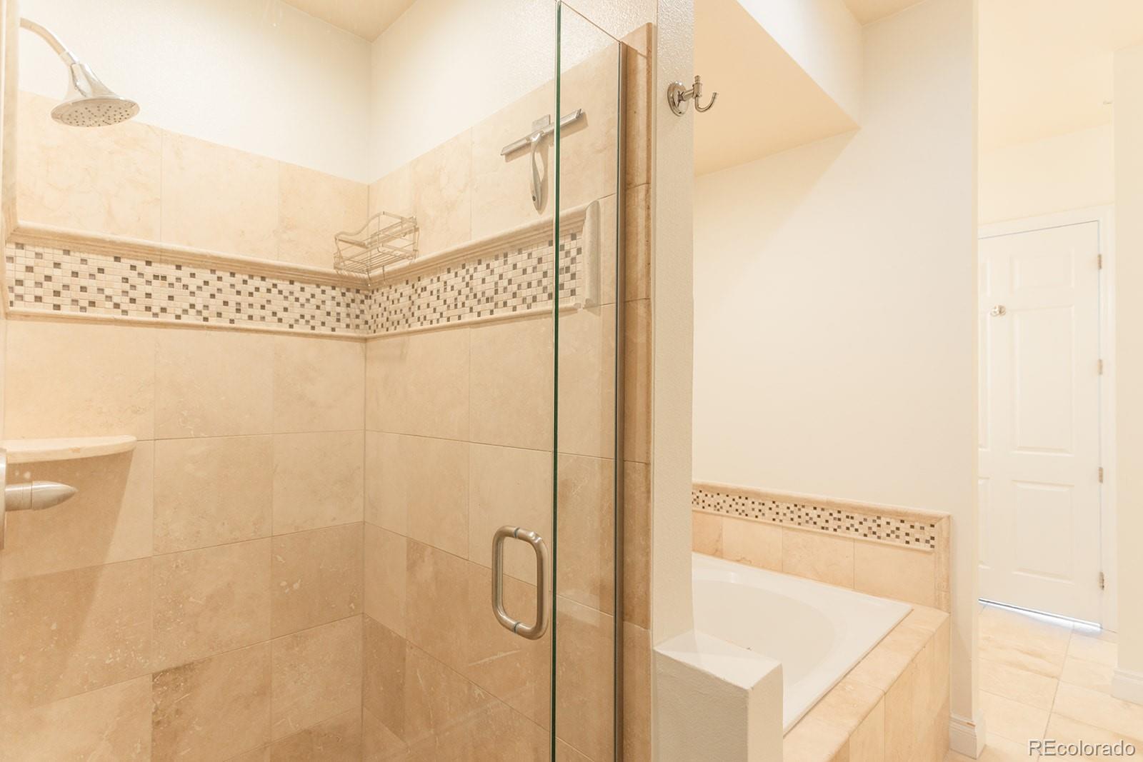 1120 Deleware, Unit 504 Denver, CO 80204 - Photo 18 of 29 a bathroom with a shower