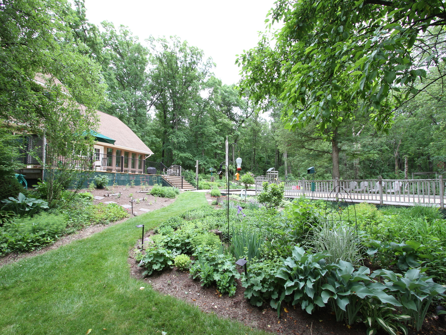 1119 Deerpass Road Marengo, IL 60152 - Photo 14 of 39 a house view with a garden space