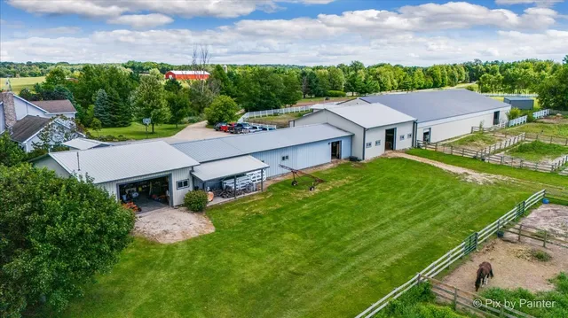 a view of a livingroom with furniture and a garage