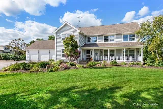 a spacious bathroom with a bathtub sink and a window