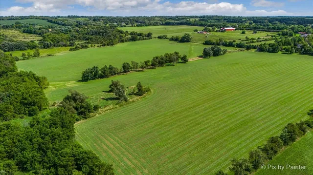 an aerial view of a golf course with a garden