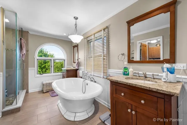 a picture of a room with a white wall and a painting