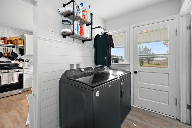a kitchen with a sink and a stove top oven