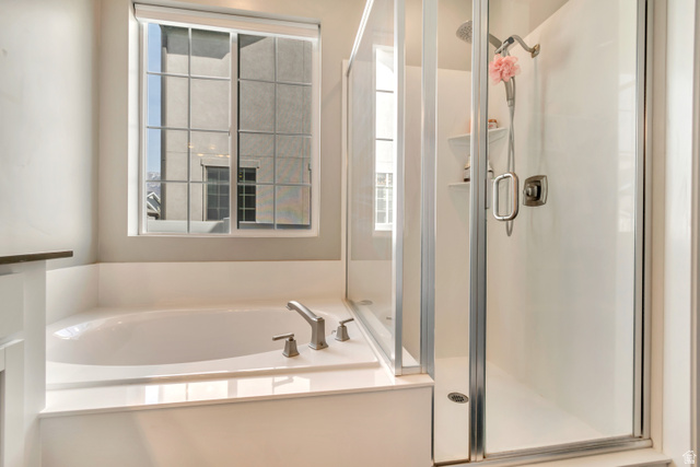 3232 West 1670th Street North Provo, UT 84601 - Photo 16 of 33 Full bathroom featuring a stall shower and a bath