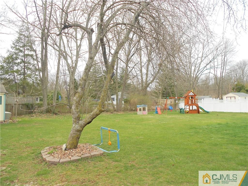 29 Kendall Road Kendall Park, NJ 08824 - Photo 20 of 22 a view of a green field