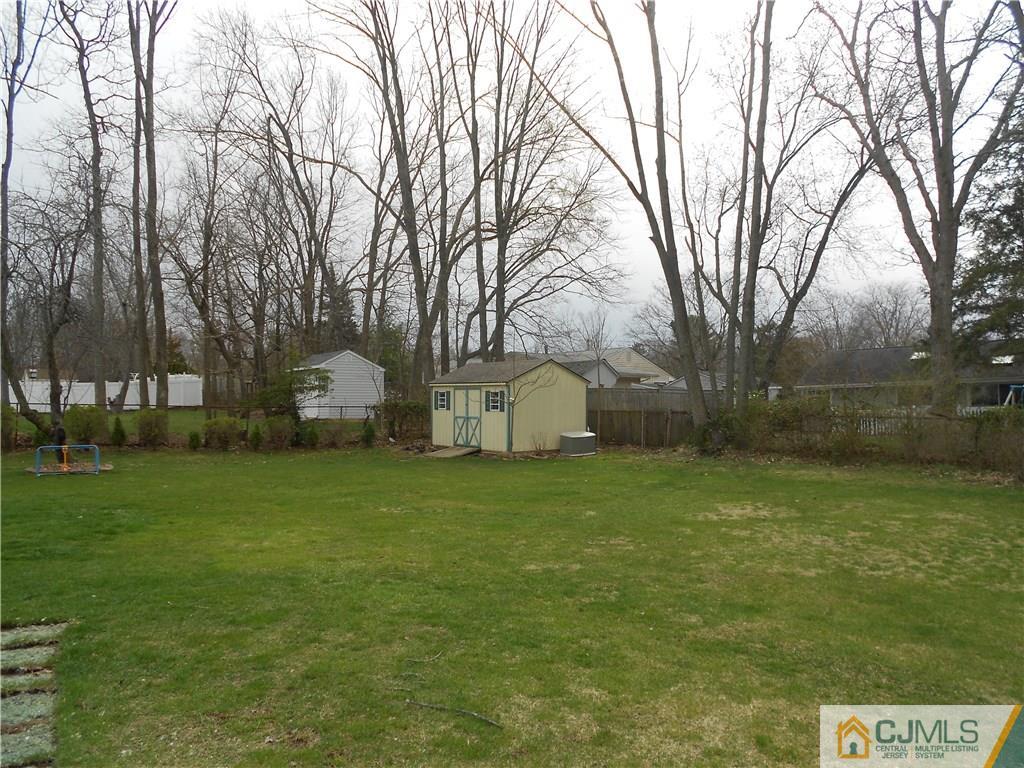 29 Kendall Road Kendall Park, NJ 08824 - Photo 21 of 22 a front view of a house with garden