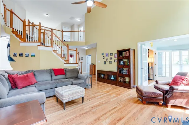 a bathroom with a granite countertop sink mirror and a bathtub