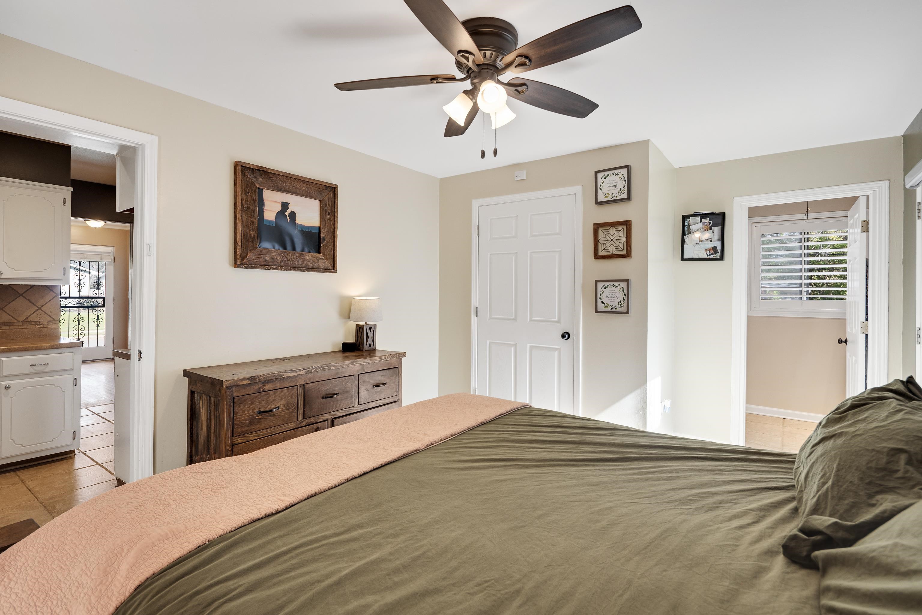 1130 Wilmore Road Memphis, TN 38117 - Photo 19 of 35 Bedroom with light tile patterned floors and ceiling fan
