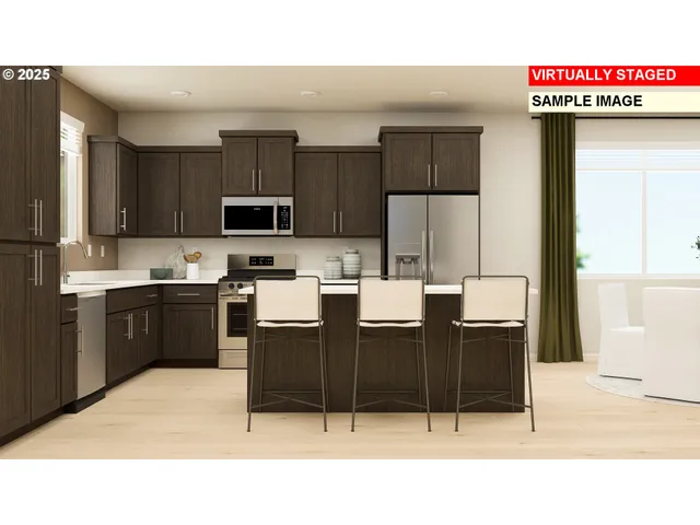 a kitchen with a sink a counter top space and stainless steel appliances