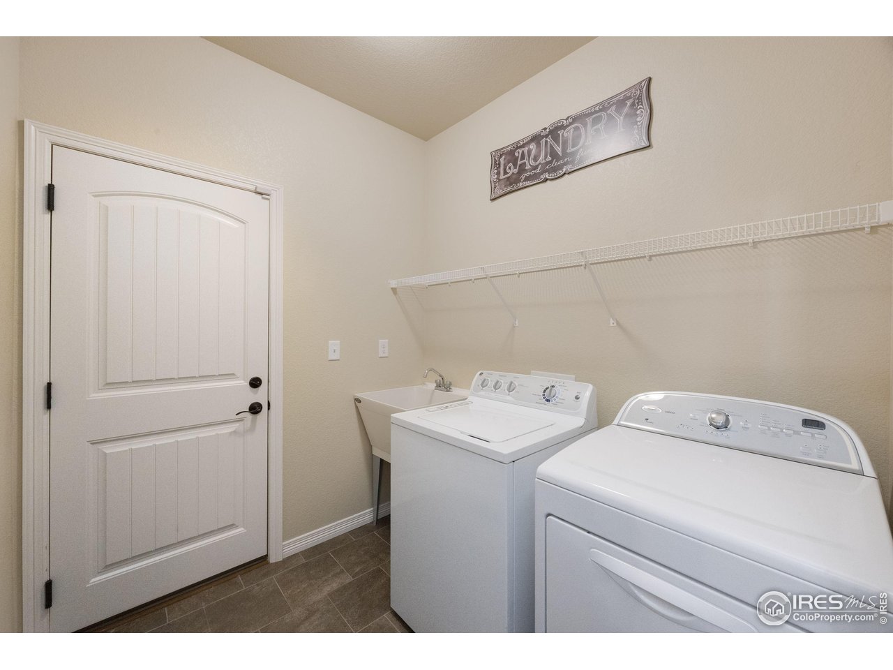 1324 Means Lane Berthoud, CO 80513 - Photo 27 of 44 Convenient laundry off the garage with sink