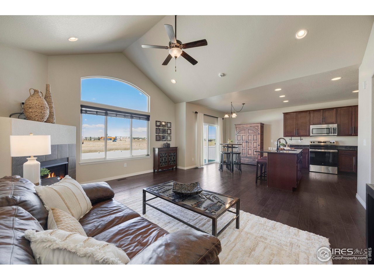 1324 Means Lane Berthoud, CO 80513 - Photo 8 of 44 Living room open to dining and kitchen