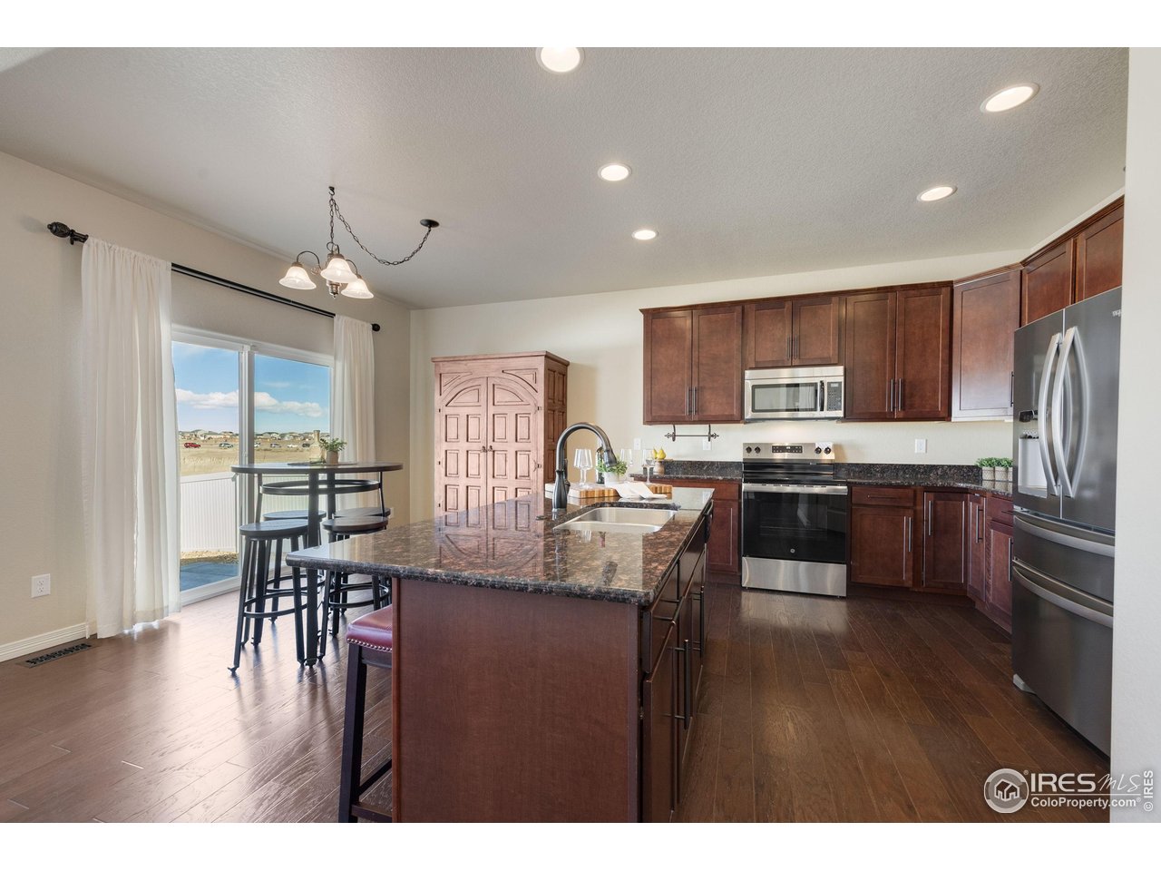 1324 Means Lane Berthoud, CO 80513 - Photo 9 of 44 Granite counter tops and NEW stainless appliances