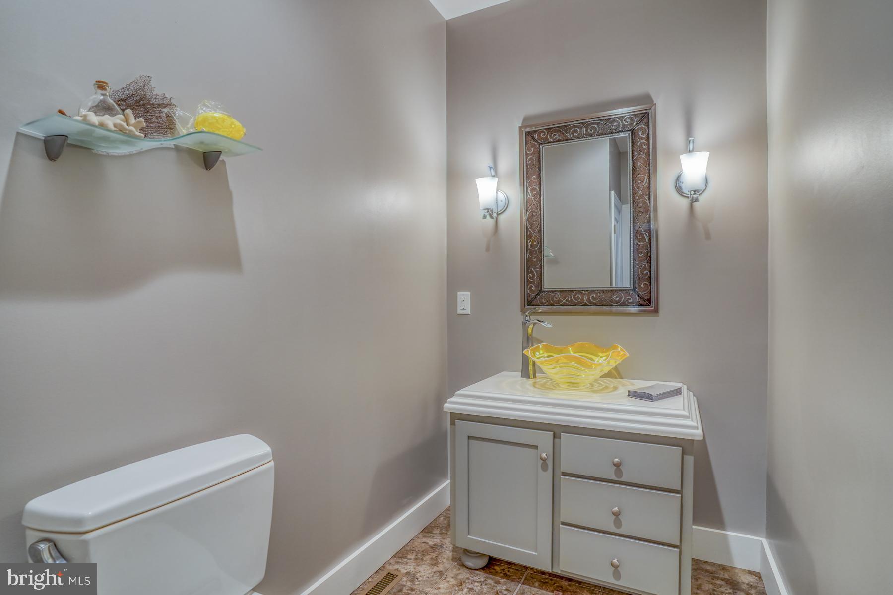 30450 Half Shell Road Milton, DE 19968 - Photo 41 of 73 Large powder room on first level