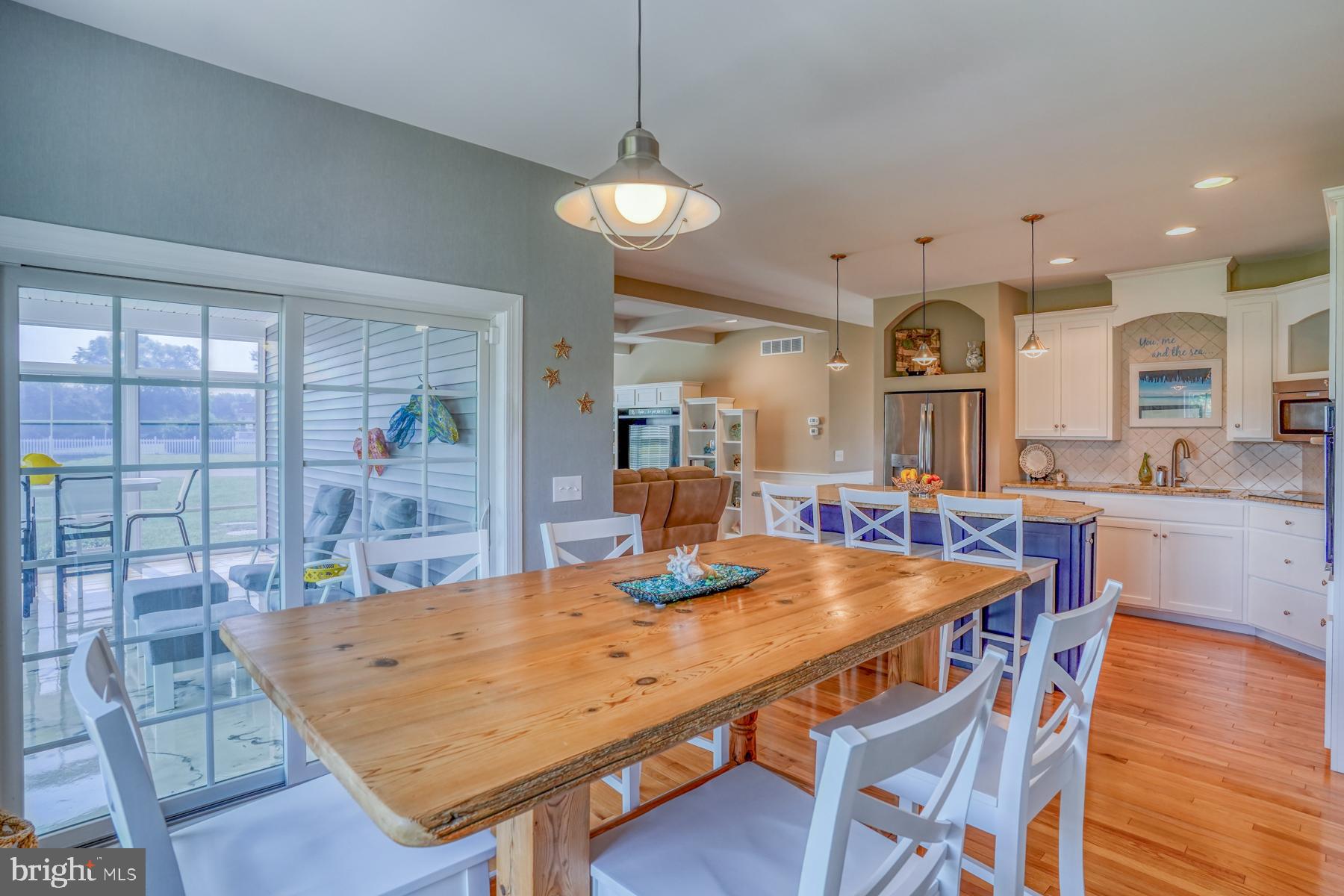 30450 Half Shell Road Milton, DE 19968 - Photo 6 of 73 Dining Room off Kitchen open to Three Season Room