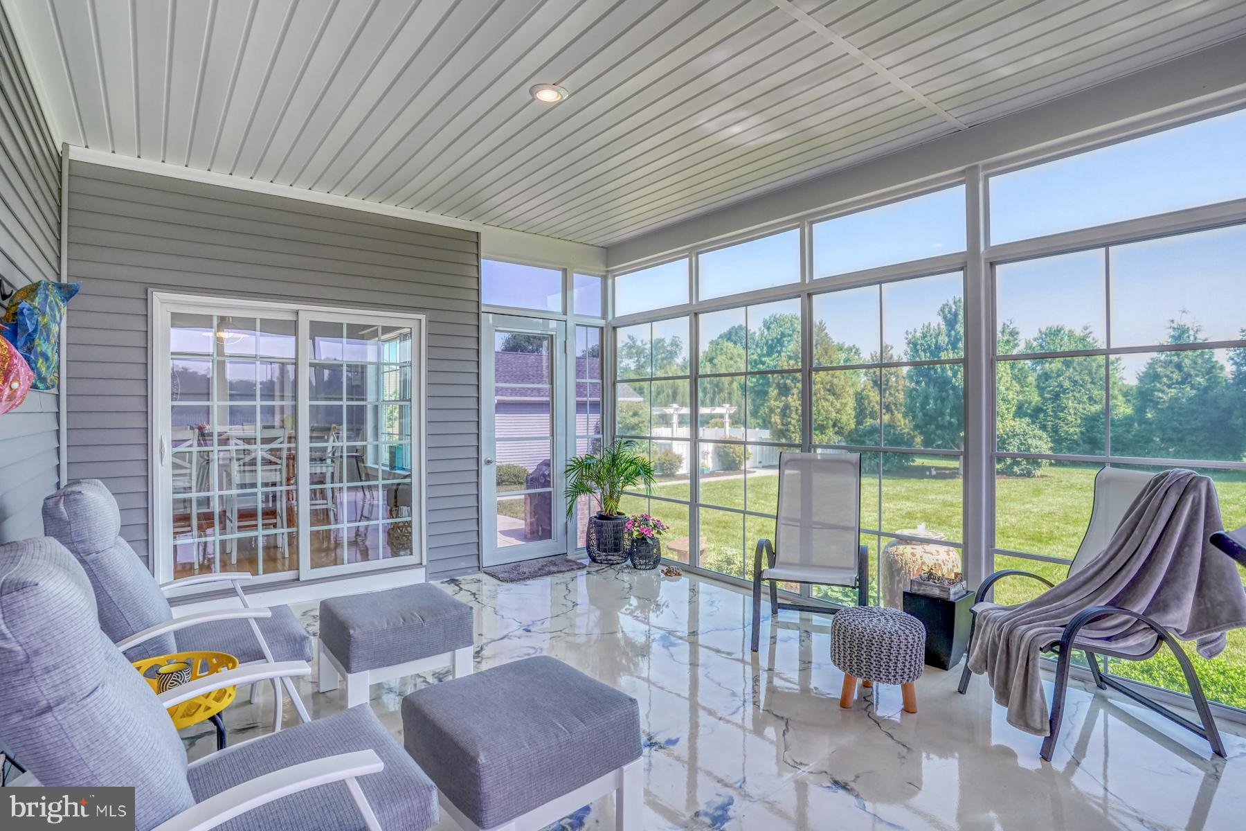 30450 Half Shell Road Milton, DE 19968 - Photo 8 of 73 Three Season Room with epoxy floor