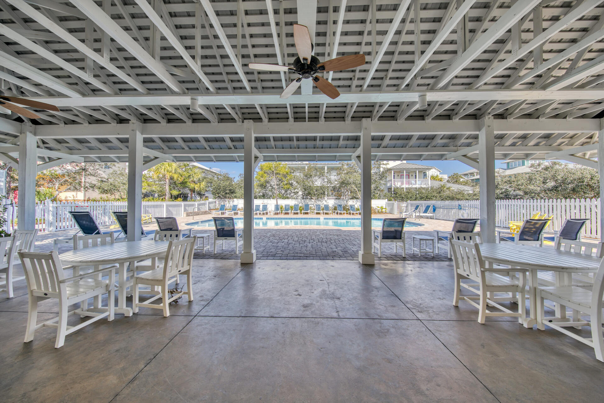 Lot 39 Old Beach Road Santa Rosa Beach, FL 32459 - Photo 12 of 26 a room with lots of wooden furniture and a chandelier