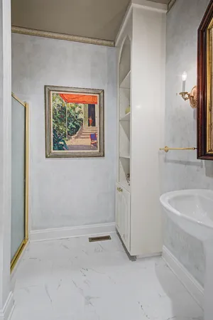 a bathroom with a bathtub and a sink