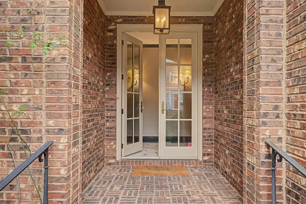 a view of a brick buildings with many windows